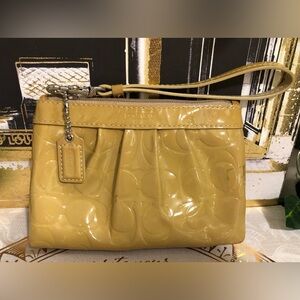 Auth. COACH High Gloss Patent Embossed Wristlet in Mustard Yellow